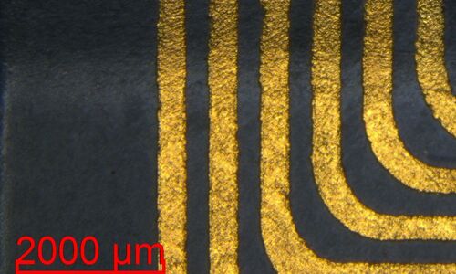 Examination of conductor paths using microscopy
