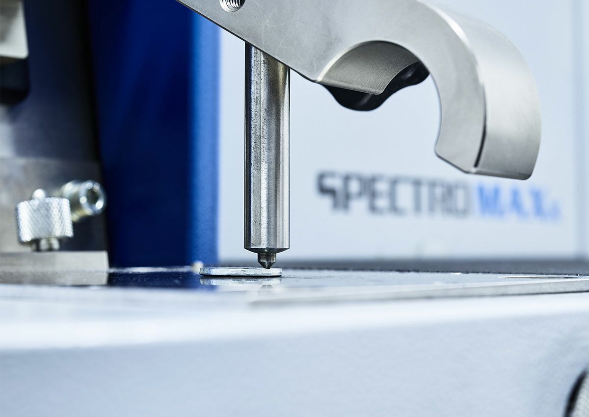 Spark emission spectroscopy to determine the chemical composition of metallic materials